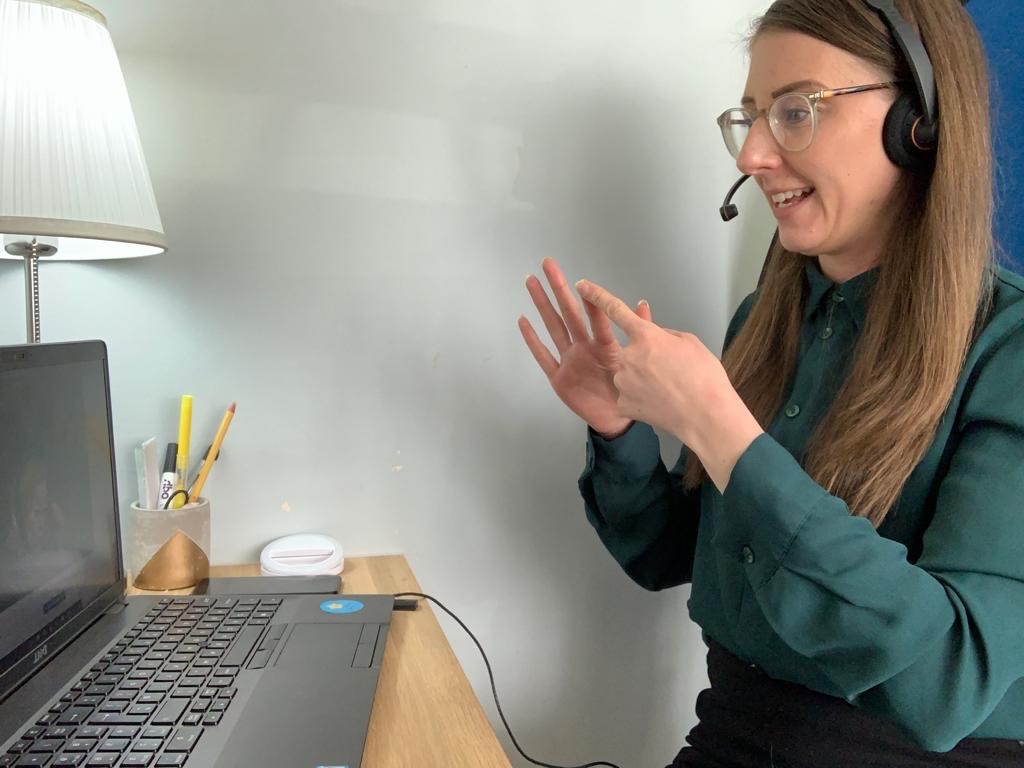 Communicating via sign language over video